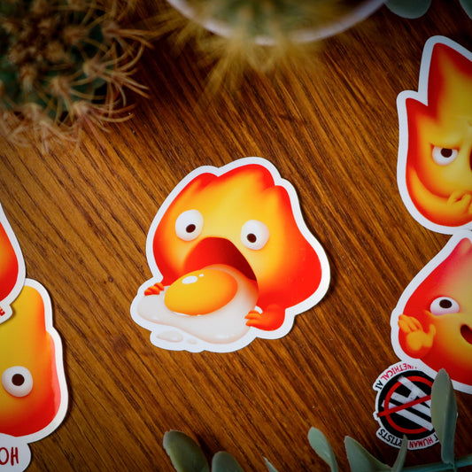 Calcifer eating egg Sticker - Stickers - Darrana Art