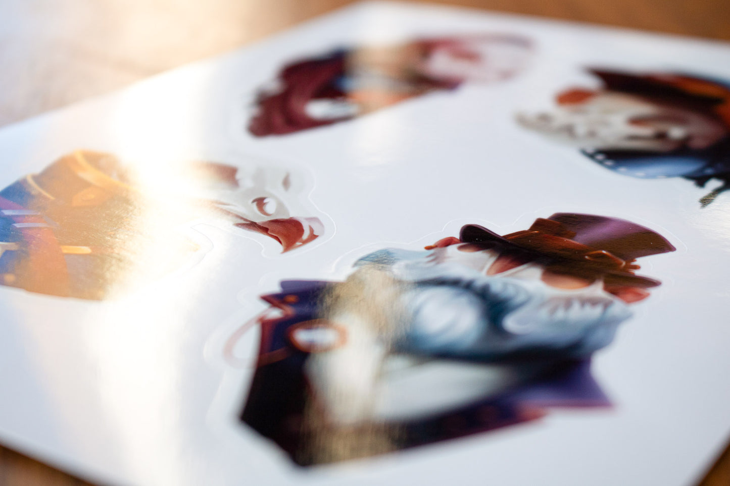 Close-up shot of a shiny kiss-cut sticker sheet with steampunk skulls
